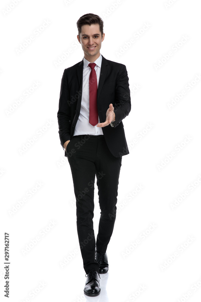 Cheerful businessmangiving a handshake Cheerful businessmangiving a handshake