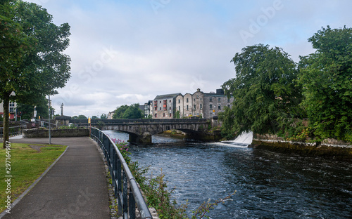 City center Galway and the River Corrib with old buildings, bridges, fauna and cloudy sky. Taken in sumer. © Michaella