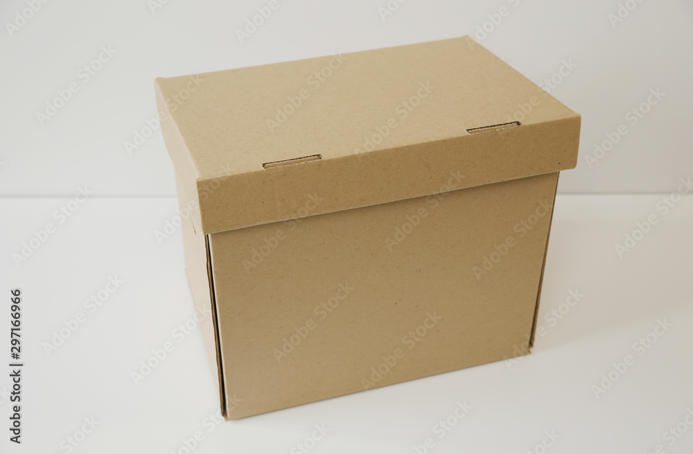 closed cardboard box isolated on white background. With copy space for text. Cargo, shipping. Packaging. closed cardboard box isolated on white background. With copy space for text. Cargo, shipping. Packaging.