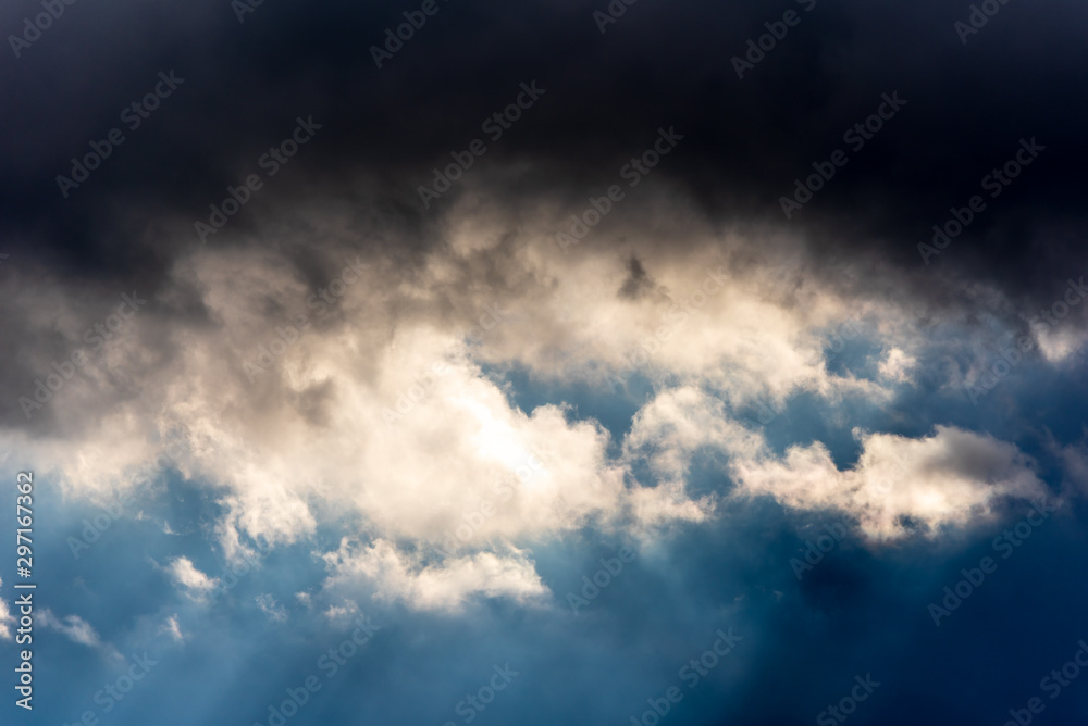 Dark clouds and sun rays