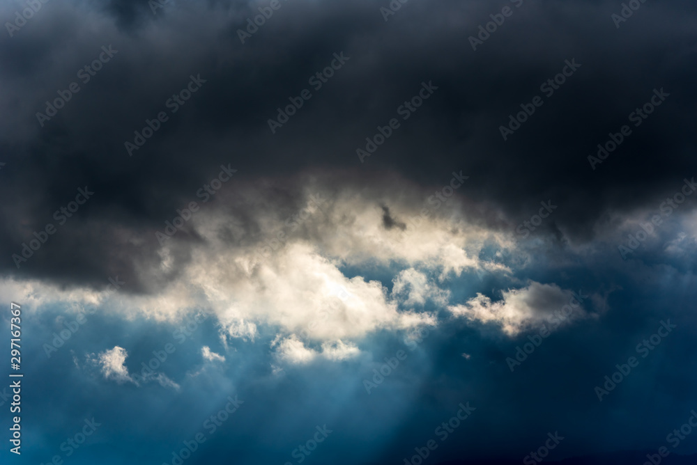 Dark clouds and sun rays