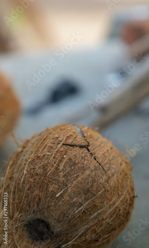 Closeup shot of Focus on coconut bursting on the ground
