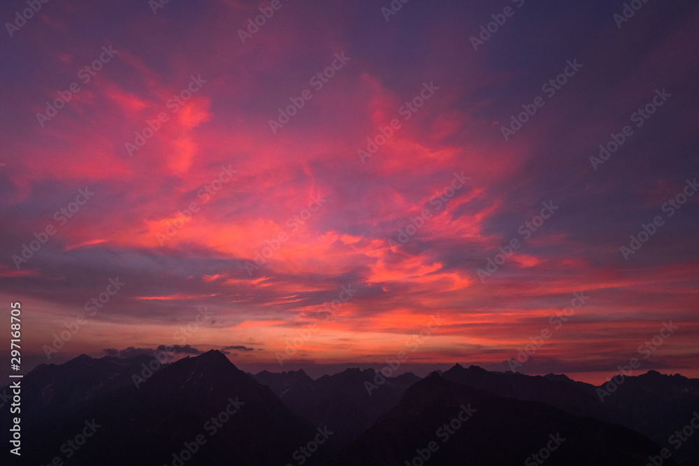 burning red sky in the alps  