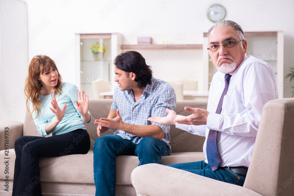 Fototapeta premium Young pair visiting experienced doctor psychologist