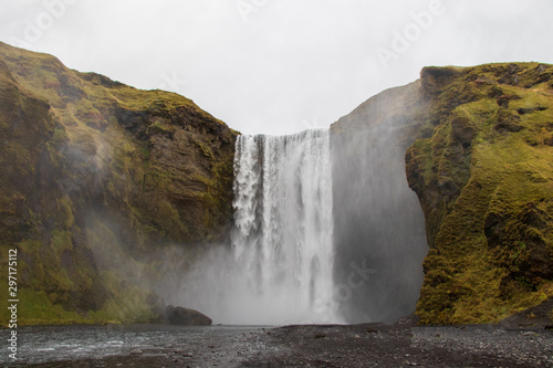 Waterfall in Iceland in cloudy weather