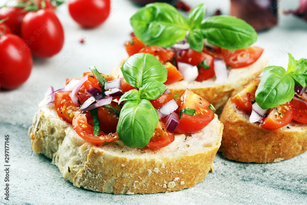 fresh tomato bruschetta. italian food appetizer with basil on table fresh tomato bruschetta. italian food appetizer with basil on table