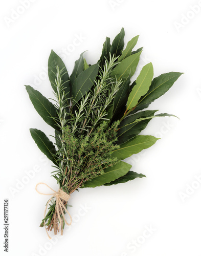 Bunch of aromatic herbs isolated on white background. Bouquet garni.  photo