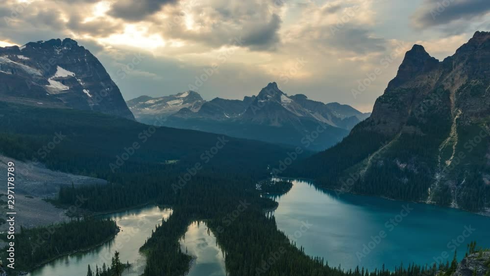 Golden clouds above lake O'Hara time lapse 4K