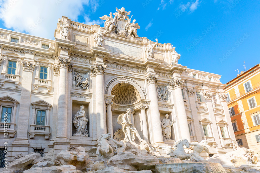 Famous landmark fountain di Trevi in Rome, Italy during summer sunny day.