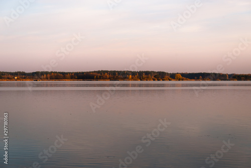 Lake at sunset. Calm scenery