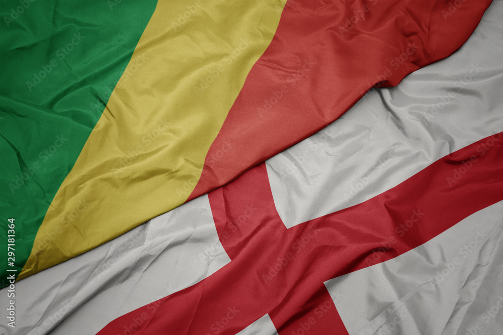 waving colorful flag of england and national flag of republic of the congo. waving colorful flag of england and national flag of republic of the congo.