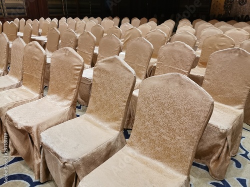 Banquet chairs in a seminar conference hall. Party chairs for wedding ceremony.