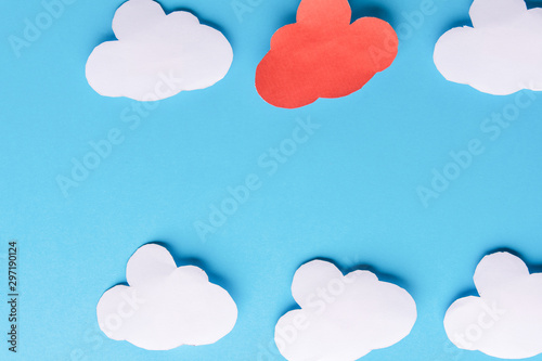 White paper clouds on blue background. Cloud computing concept. Copy space