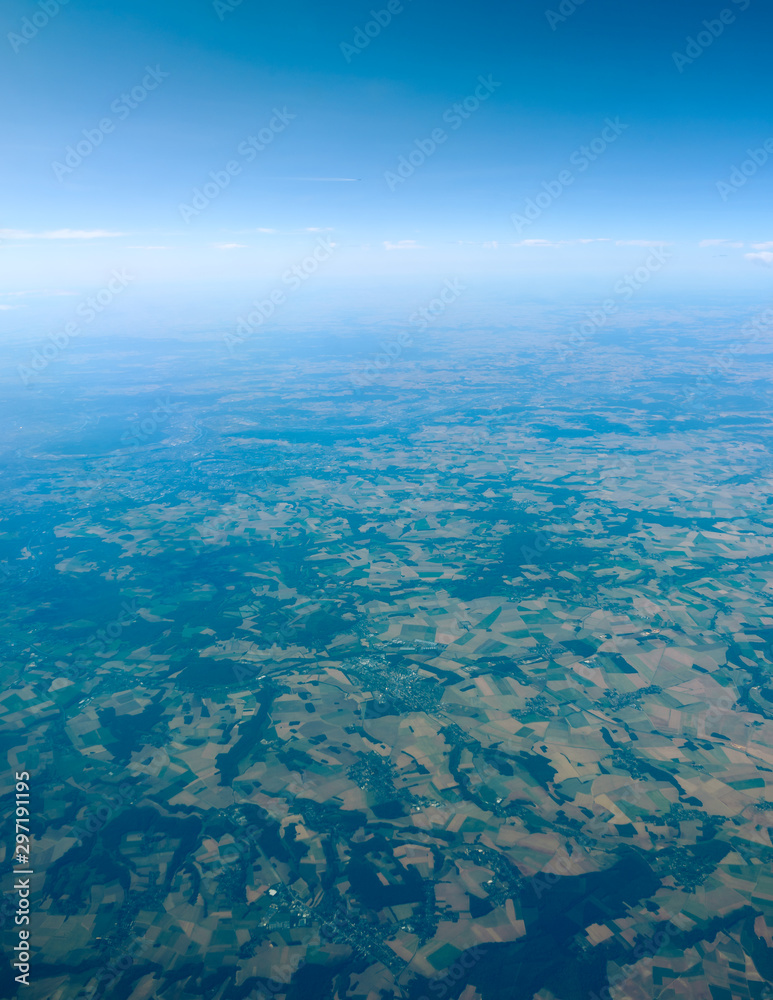 aerial landscape view of Europe, England and blue sky from plane