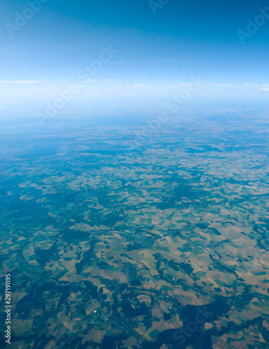 aerial landscape view of Europe, England and blue sky from plane © Maksims