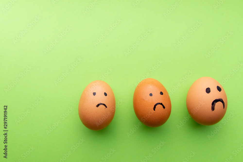 three brown Eggs arranged in carton three brown Eggs arranged in carton