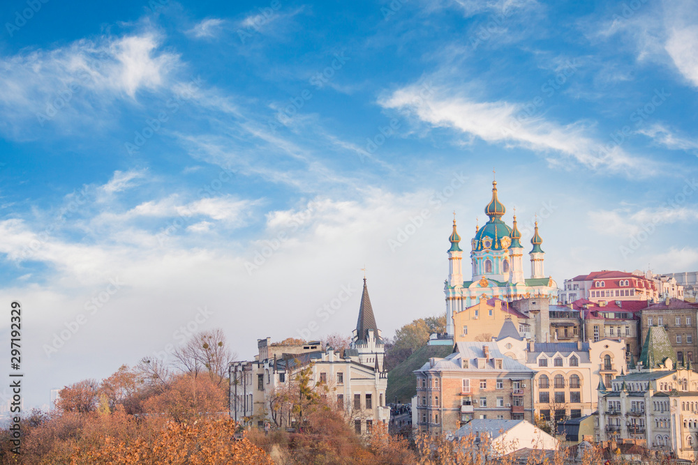 Obraz premium Beautiful view of St. Andrew's Church and St. Andrew's Descent in Kyiv, Ukraine