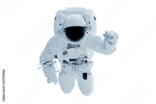 Fototapeta Naklejka Na Ścianę i Meble -  Astronaut in a darkened spacesuit waving his hand. Isolated on a white background. Elements of this image were furnished by NASA.