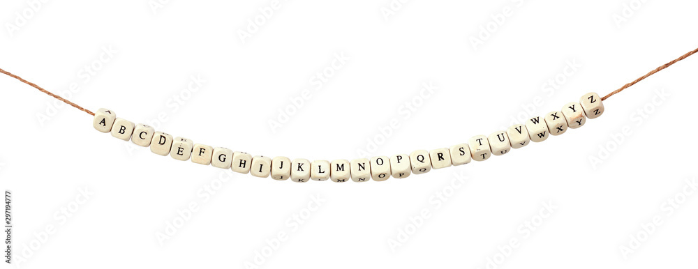 Naklejka premium English alphabet from cubes on a rope