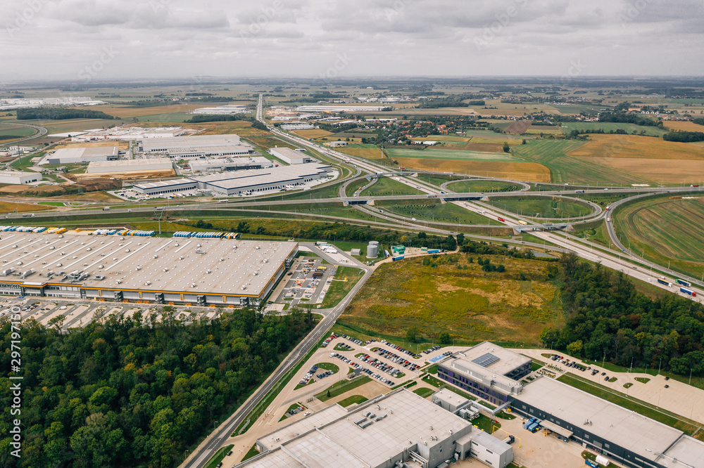 Aerial view of the distribution center, drone photography of the industrial logistic zone.