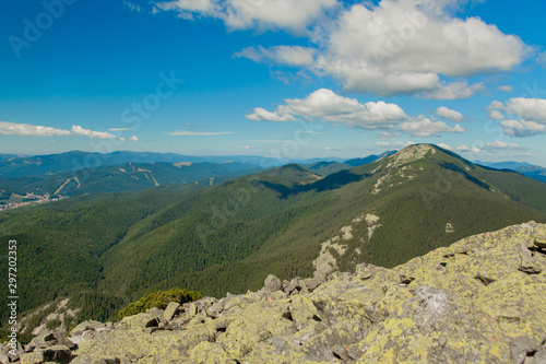 Beautiful mountain landscape  with mountain peaks covered with forest and a cloudy sky. Ukraine mountains  Europe