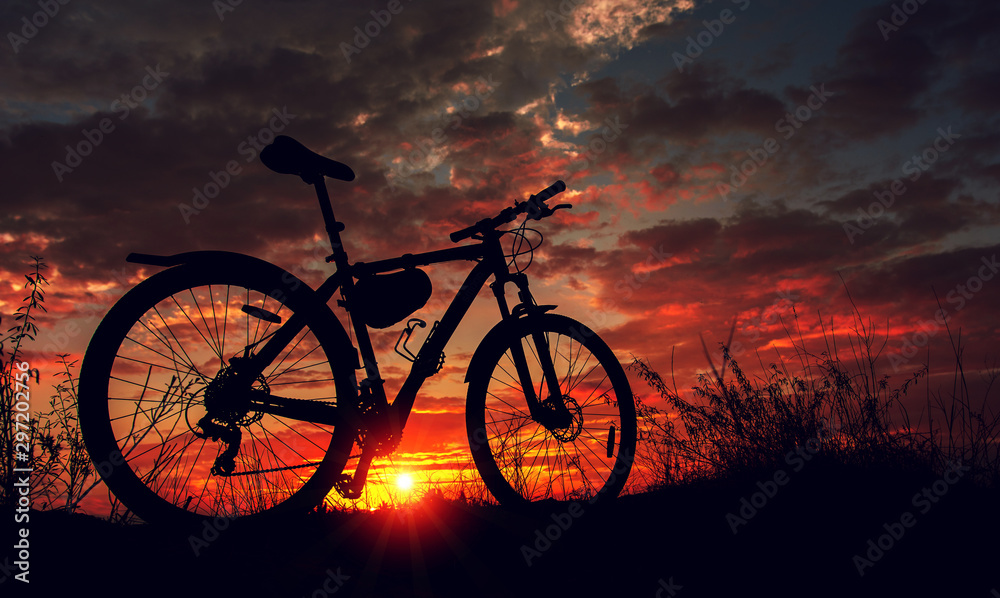 Fototapeta premium bike in the background fire sunset.