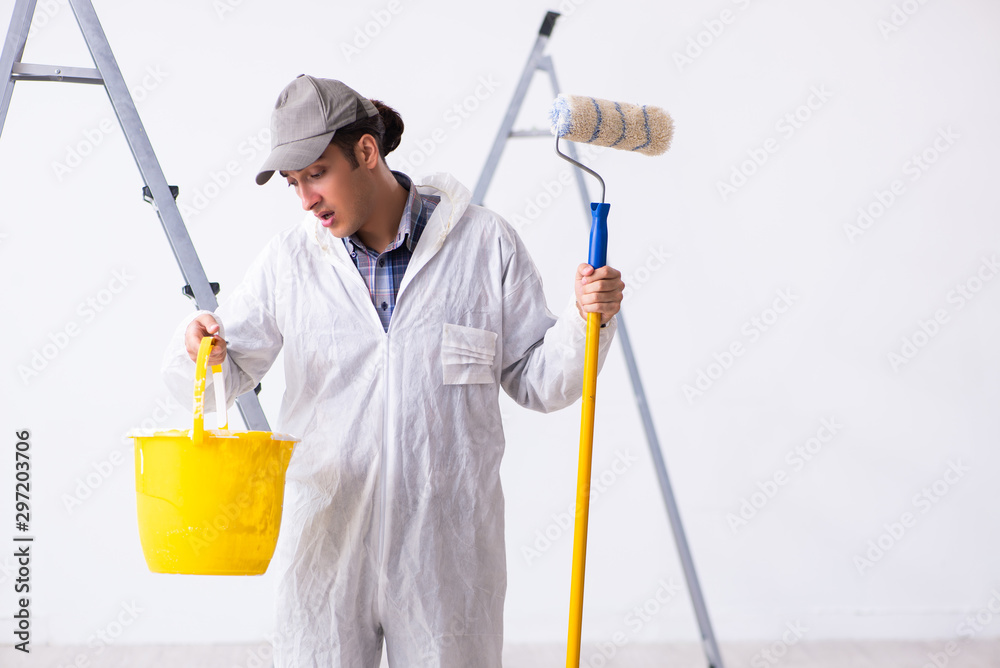 Painter working at construction site