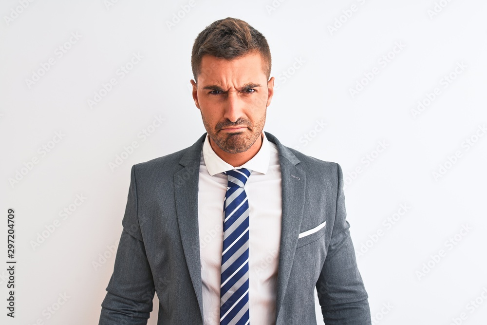 Young handsome business man wearing suit and tie over isolated background depressed and worry for distress, crying angry and afraid. Sad expression. Young handsome business man wearing suit and tie over isolated background depressed and worry for distress, crying angry and afraid. Sad expression.