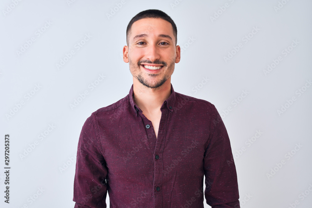 Young handsome business man standing over isolated background with a happy and cool smile on face. Lucky person. Young handsome business man standing over isolated background with a happy and cool smile on face. Lucky person.