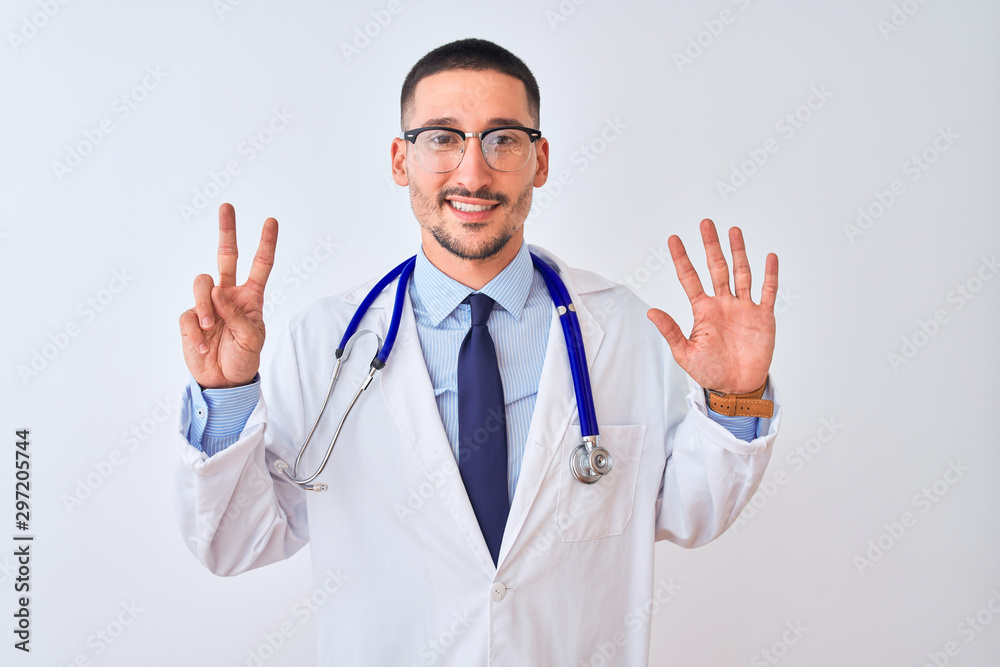 Young doctor man wearing stethoscope over isolated background showing and pointing up with fingers number seven while smiling confident and happy. Young doctor man wearing stethoscope over isolated background showing and pointing up with fingers number seven while smiling confident and happy.