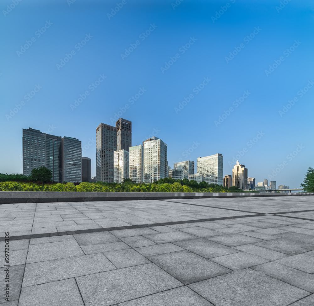Empty city square road and modern business district office buildings in Beijing, China Empty city square road and modern business district office buildings in Beijing, China