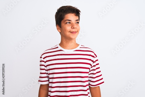 Wallpaper Mural Handsome teenager boy standing over white isolated background looking away to side with smile on face, natural expression. Laughing confident. Torontodigital.ca