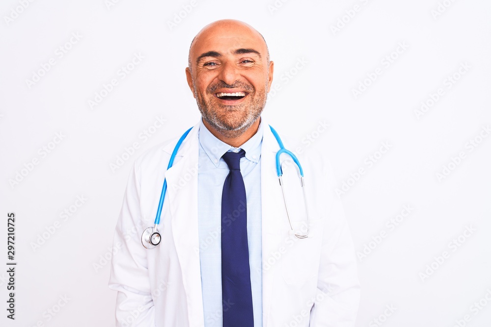 Middle age doctor man wearing stethoscope and tie standing over isolated white background with a happy and cool smile on face. Lucky person. Middle age doctor man wearing stethoscope and tie standing over isolated white background with a happy and cool smile on face. Lucky person.
