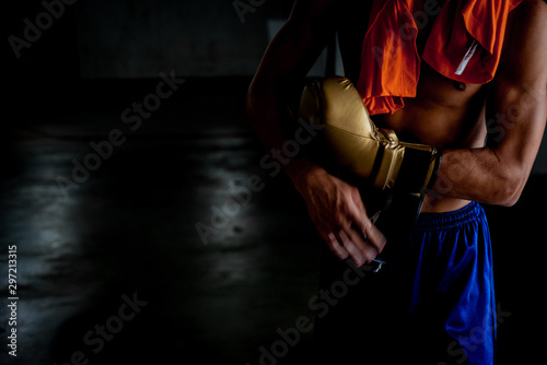 Athletic fighter man resting after boxing exercise © qunica.com