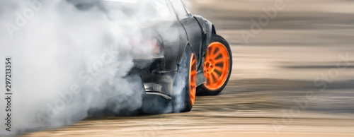 Fotografiet Race drift car burning tires on speed track
