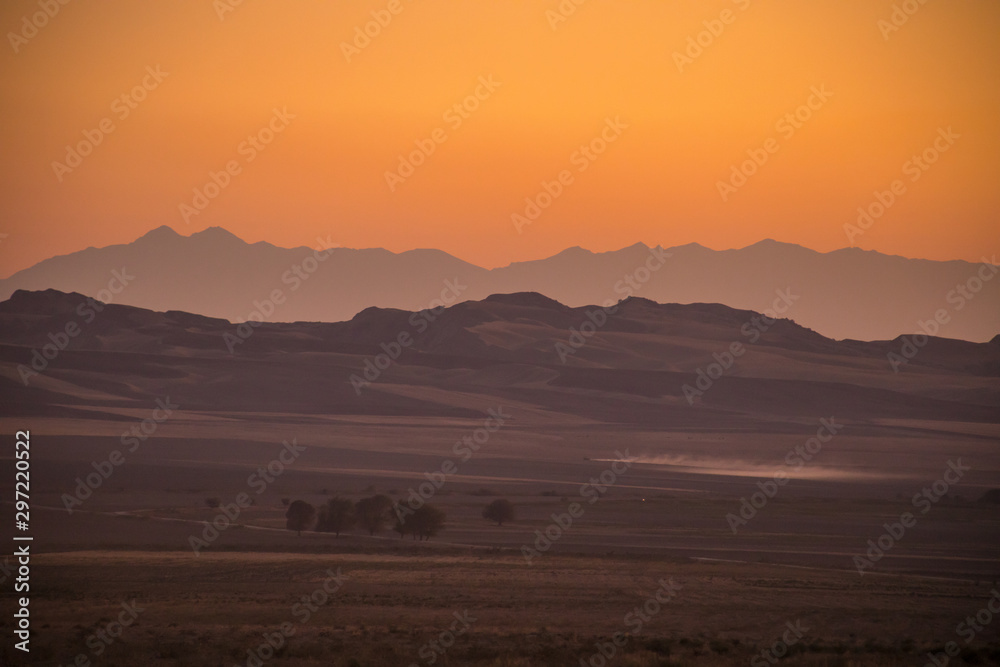 Sunset landscape view of silhouette mountains and lonely trees in Azerbaijan. Sheki Sunset landscape view of silhouette mountains and lonely trees in Azerbaijan. Sheki