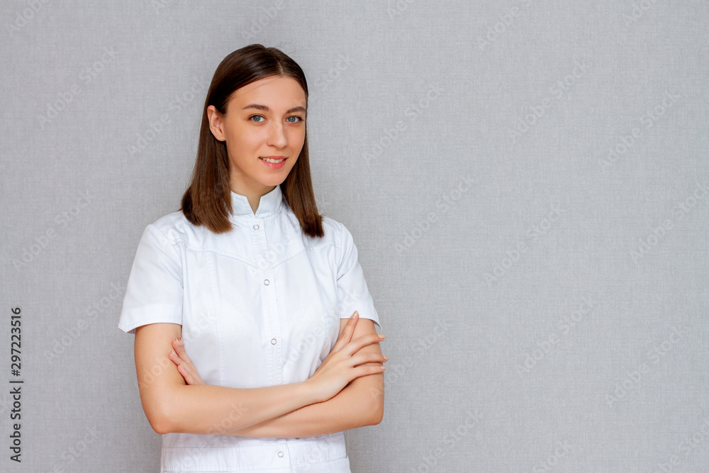 female doctor in white coat studio portrait look at camera female doctor in white coat studio portrait look at camera