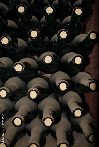 Rows of Stacked Wine Bottels Behind in an Underground Wine Cellar in Santiago Chile