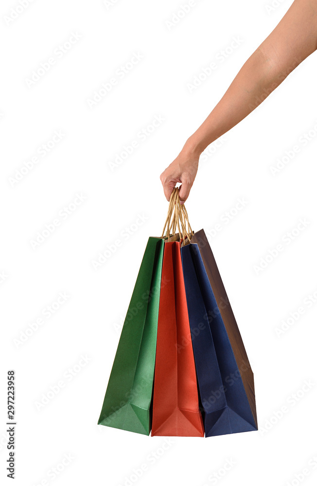 Female hand holding blank colorful papaer shopping bags