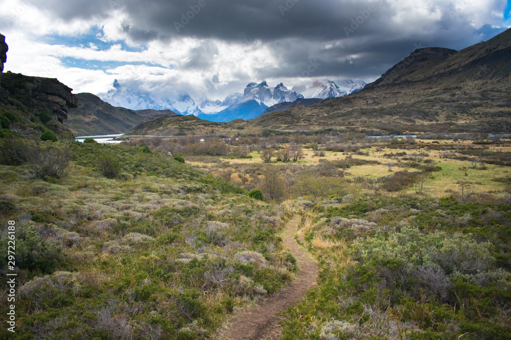 Hiking trail with Torres Del Paine Mountain Range in the Background in Patagonia Chile