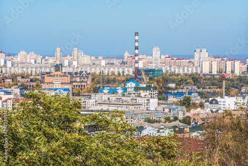 Cityscape of Kiev, Ukraine. View of apartment buildings on the right bank of the Dnieper in Podil and Obolon. photo