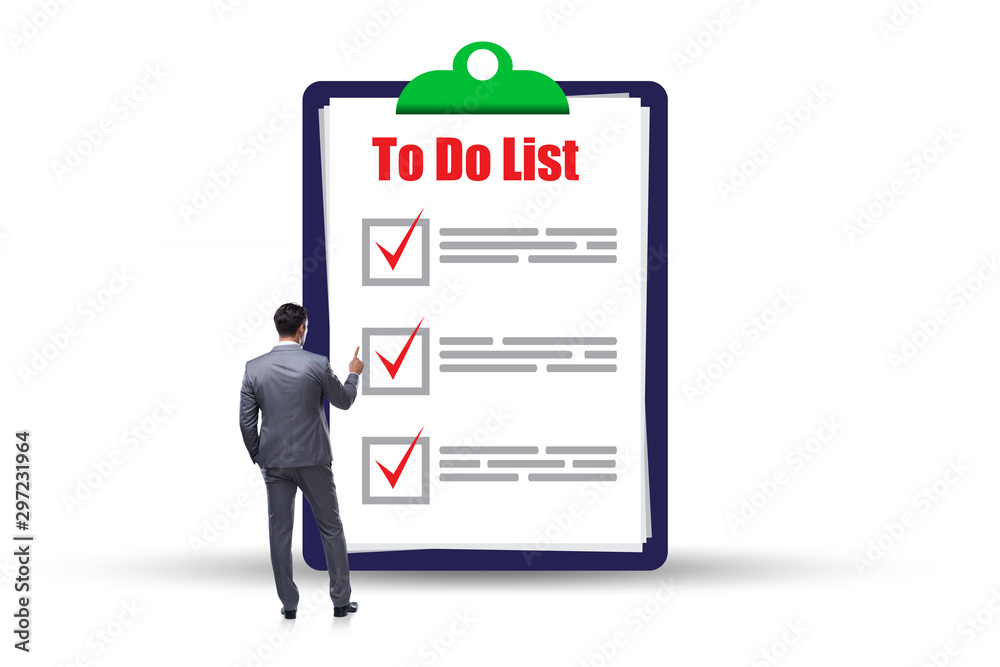 Concept of to do list with businessman Concept of to do list with businessman