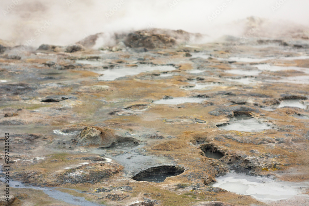 Panorama of geothermal area Hverarönd (Hverir), situated by the orange-red clay coloured tuff mountain Namafjall south of Námaskarð in Iceland, with details and patterns Panorama of geothermal area Hverarönd (Hverir), situated by the orange-red clay coloured tuff mountain Namafjall south of Námaskarð in Iceland, with details and patterns