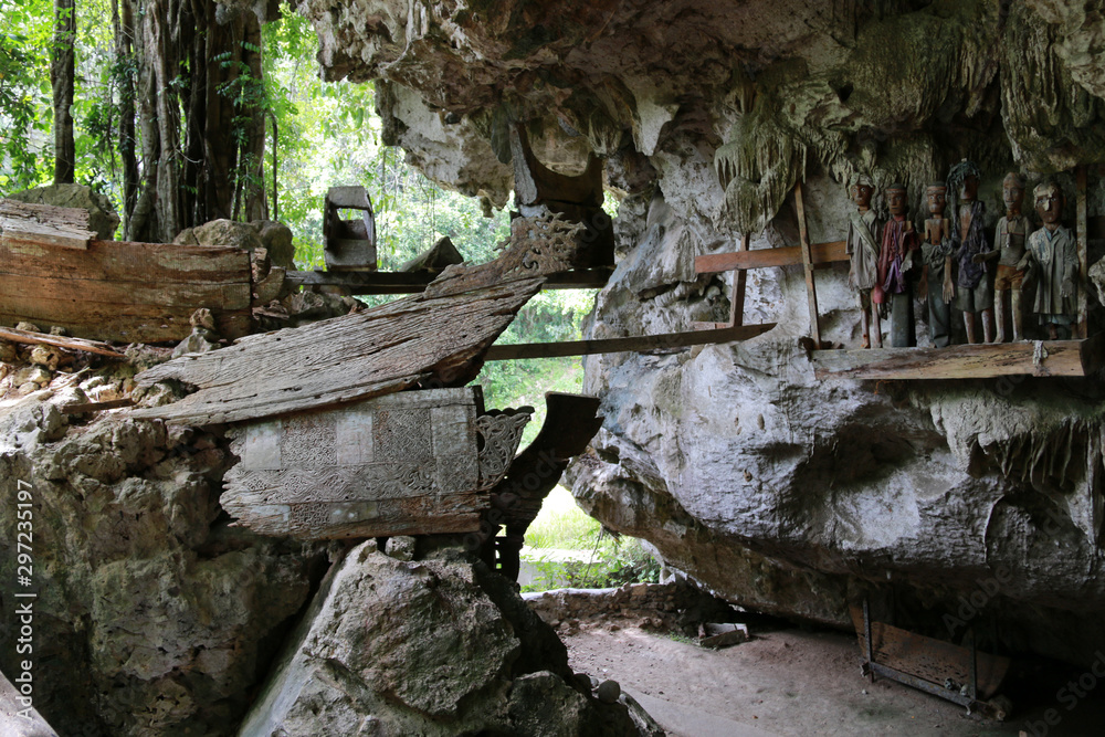 Rotten Coffins, Guardians of the Dead (Tau-Tau’s) and Human Skulls in the Tampang Allo Burial Cave, Sulawesi, Indonesia Rotten Coffins, Guardians of the Dead (Tau-Tau’s) and Human Skulls in the Tampang Allo Burial Cave, Sulawesi, Indonesia