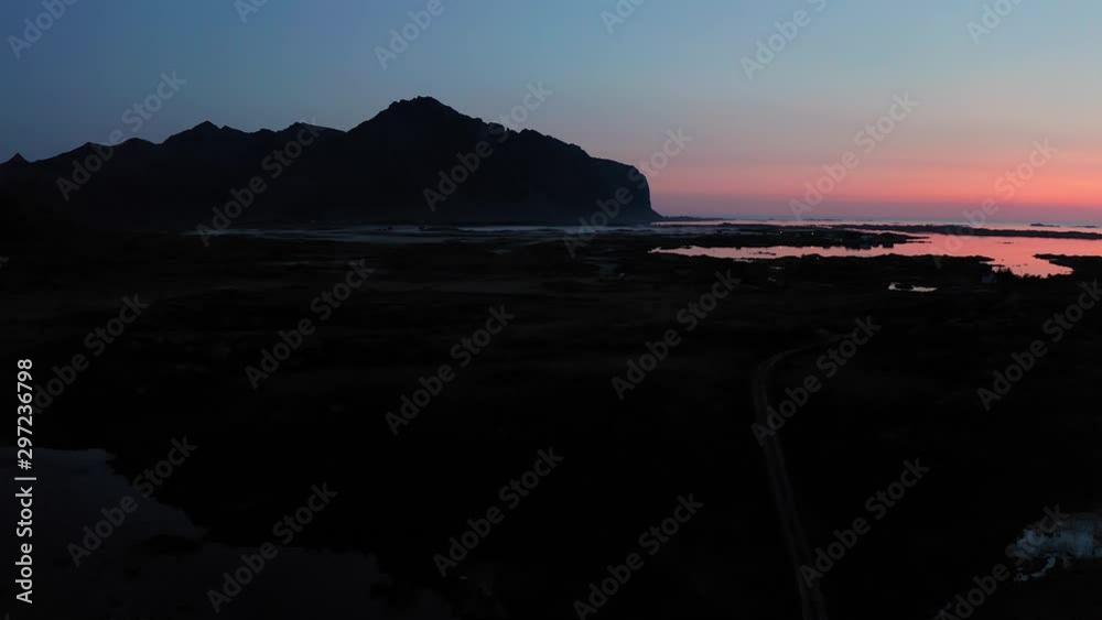 Aerial shot of Lofoten countryside in Norway during blue hour sunset Aerial shot of Lofoten countryside in Norway during blue hour sunset