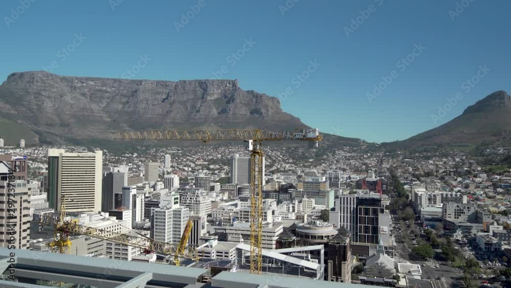 Cape Town city business district, Table Mountain backdrop. Daytime. Wide shot. Cape Town city business district, Table Mountain backdrop. Daytime. Wide shot.