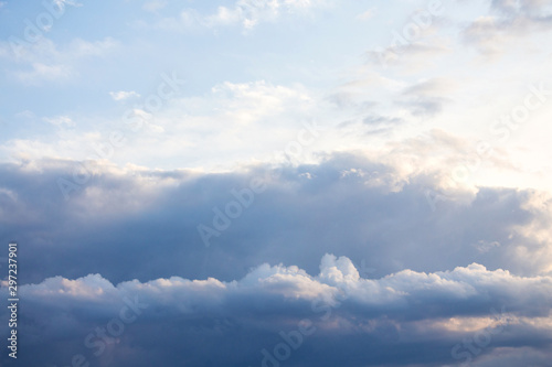 Fototapeta Naklejka Na Ścianę i Meble -  Sky with dark storm clouds below and sunlight above_