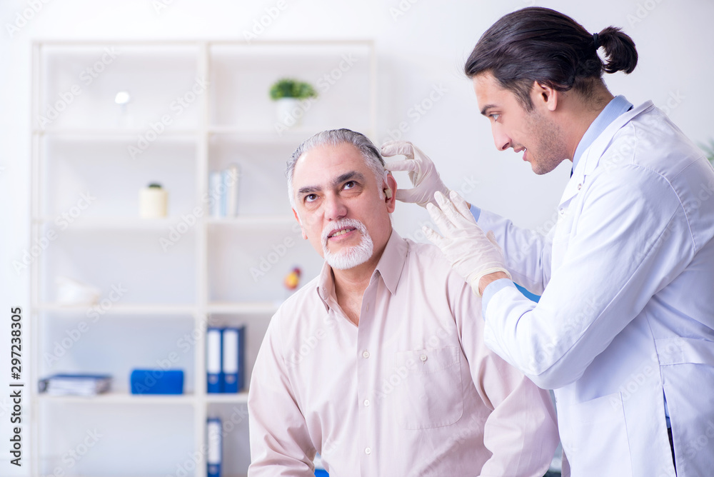 Male patient with hearing problem visiting doctor otorhinolaryng Male patient with hearing problem visiting doctor otorhinolaryng