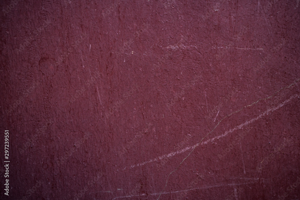 Fototapeta premium Texture of an old wall covered with paint. Background image of a worn paint coated surface