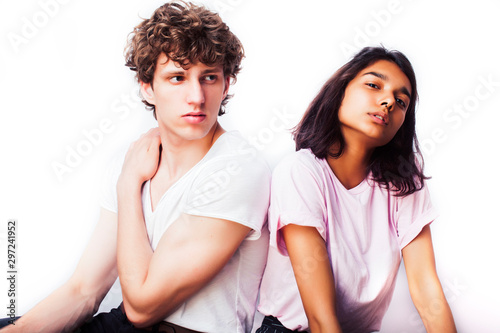 best friends teenage girl and boy together having fun, posing emotional on white background, couple happy smiling, lifestyle people concept, blond and brunette multi nations closeup